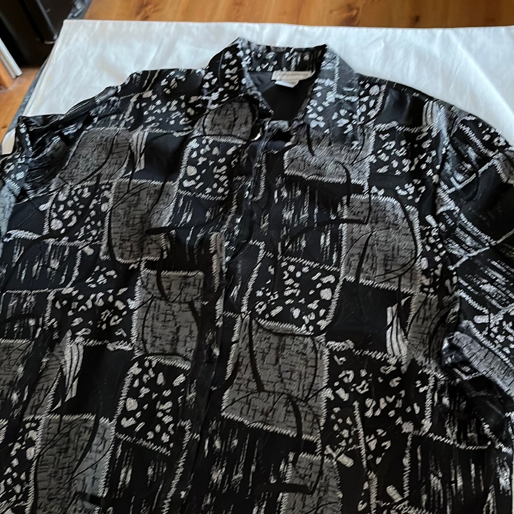 Black/gray/silver lined jacket.  3x.  Button up front and buttoned cuffs